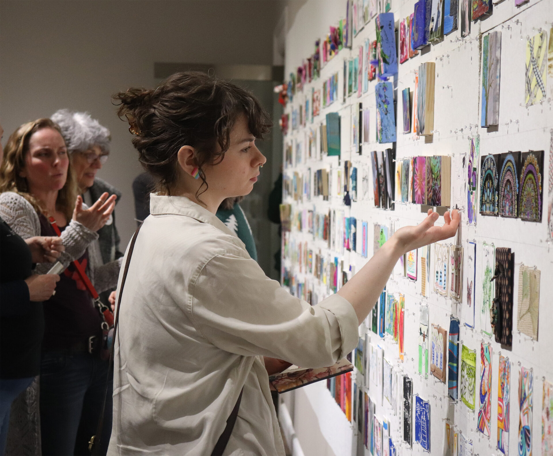 Woman looking at artwork